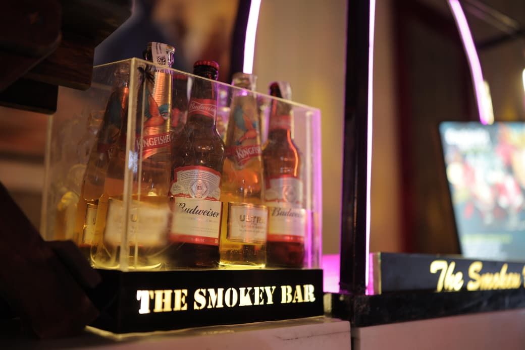 Illuminated The Smokey Bar beer display