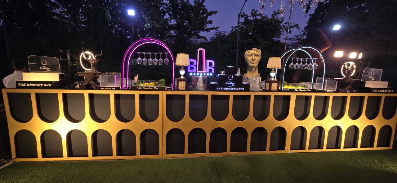 Gold arched party bar with neon